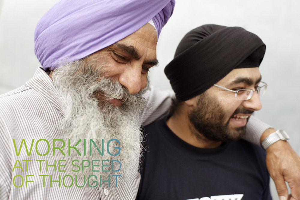 two men with headscarves and a beard