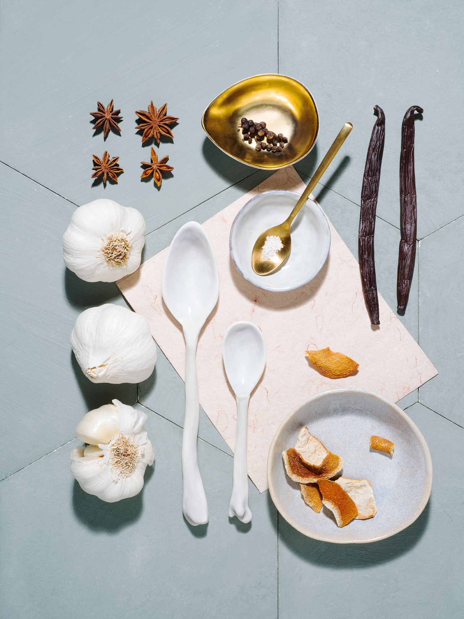 a group of spices and spoons