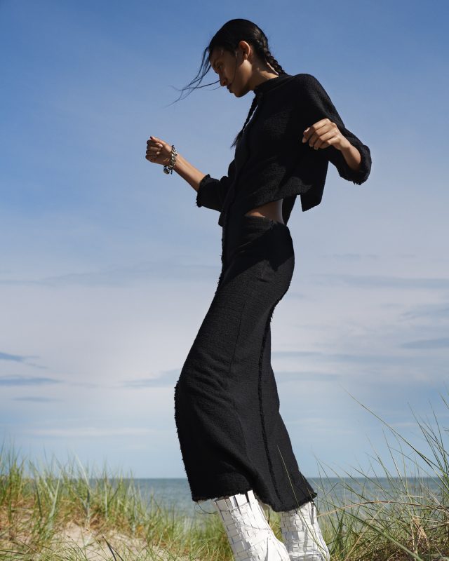 a woman in a black dress