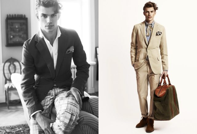 a man in a suit and a bag