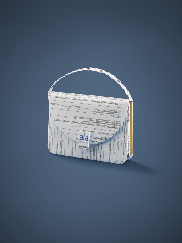 a white bag with a handle
