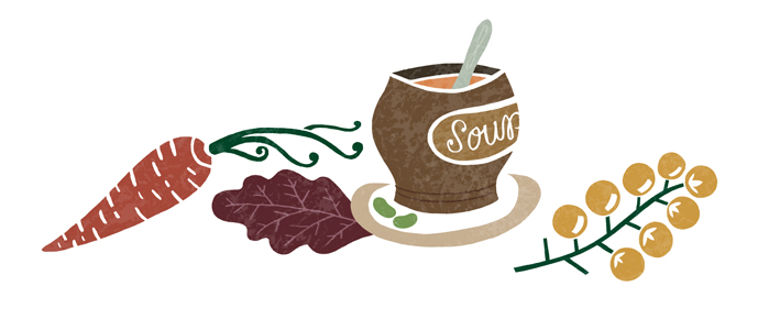 a bowl of soup with a spoon and leaves