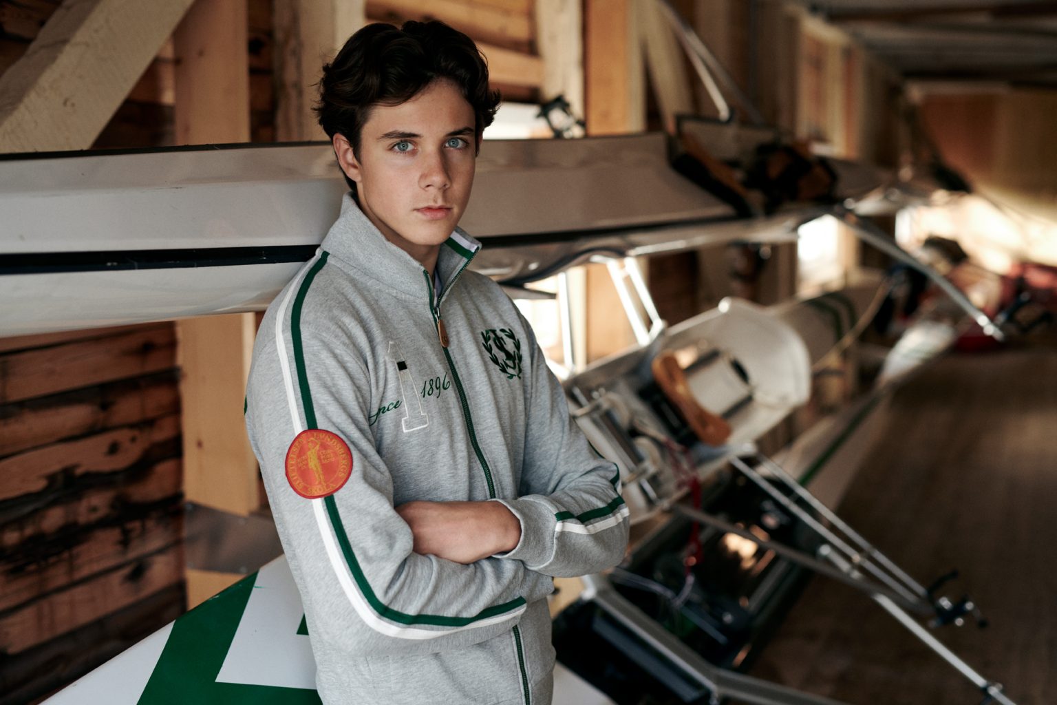 a man standing next to a plane