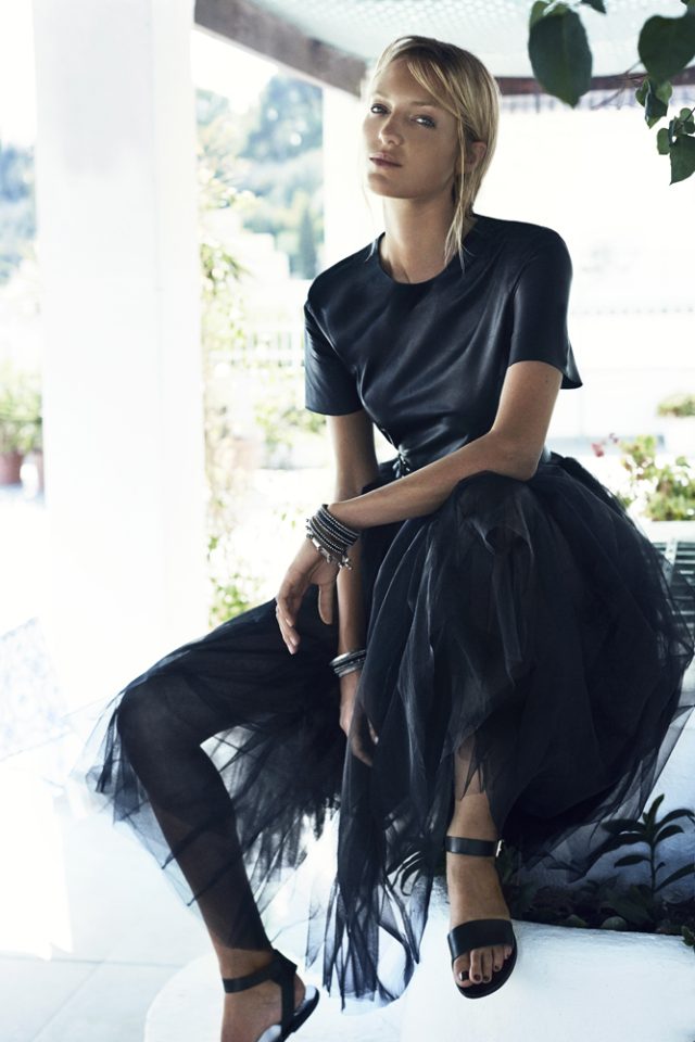 a woman in a black dress