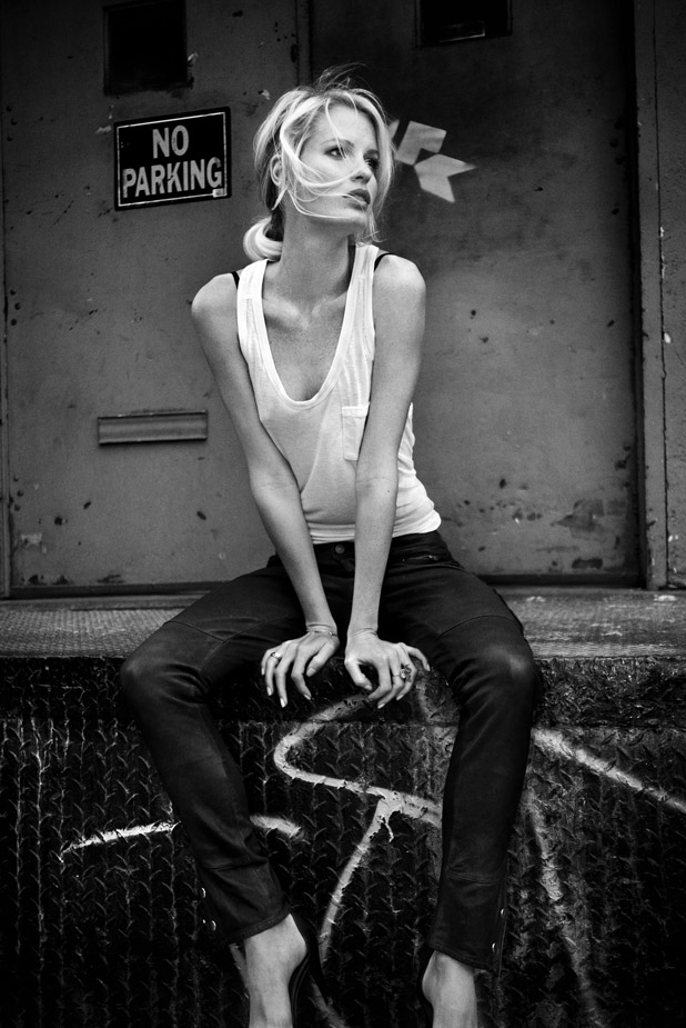 a woman sitting on a step