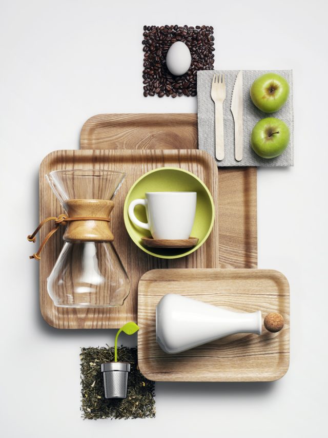 a group of wooden trays with a cup and a glass pitcher and a bottle