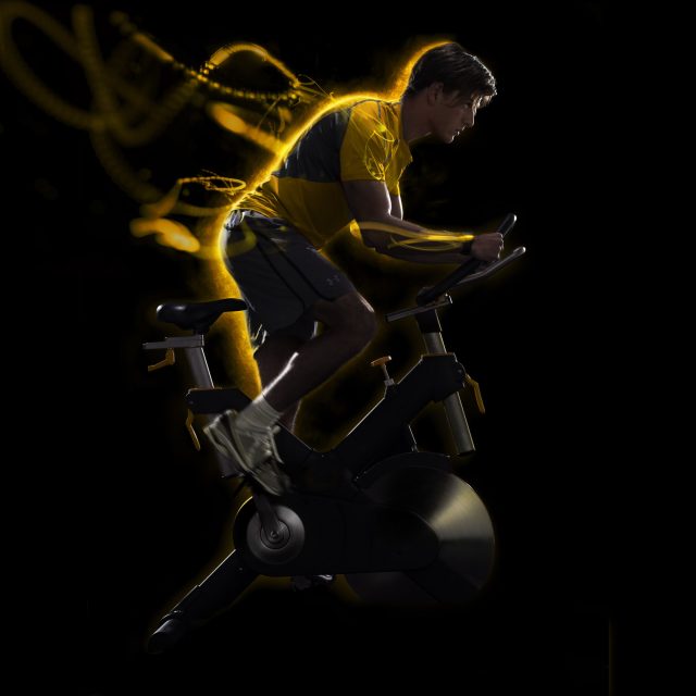 a man on a stationary bike