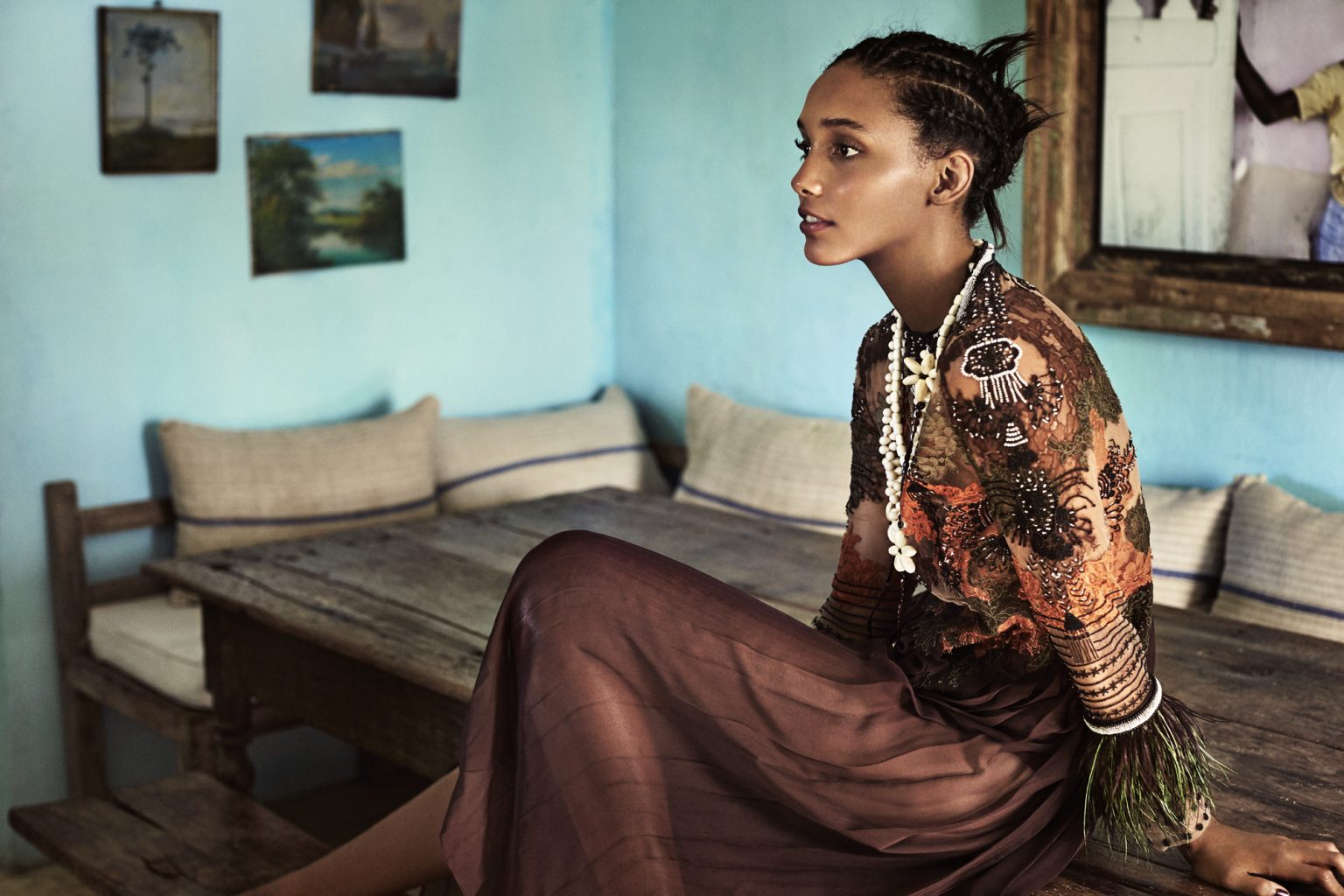 a woman sitting on a bench