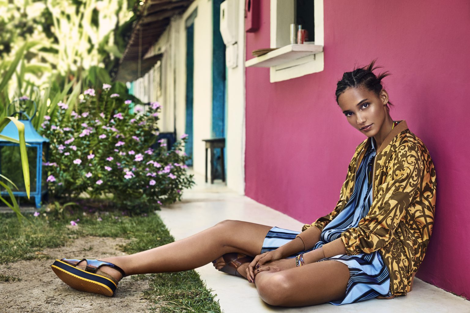 a woman sitting on the ground