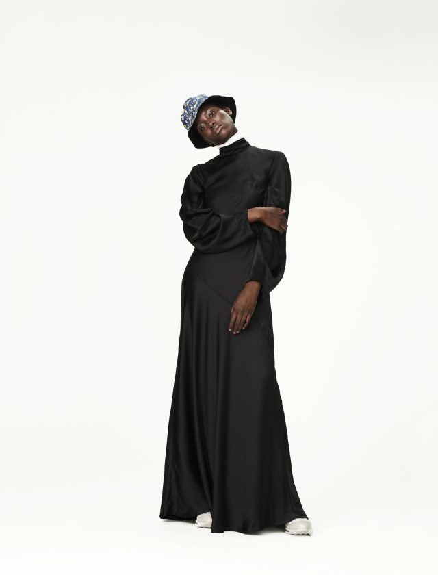 a woman in a black dress