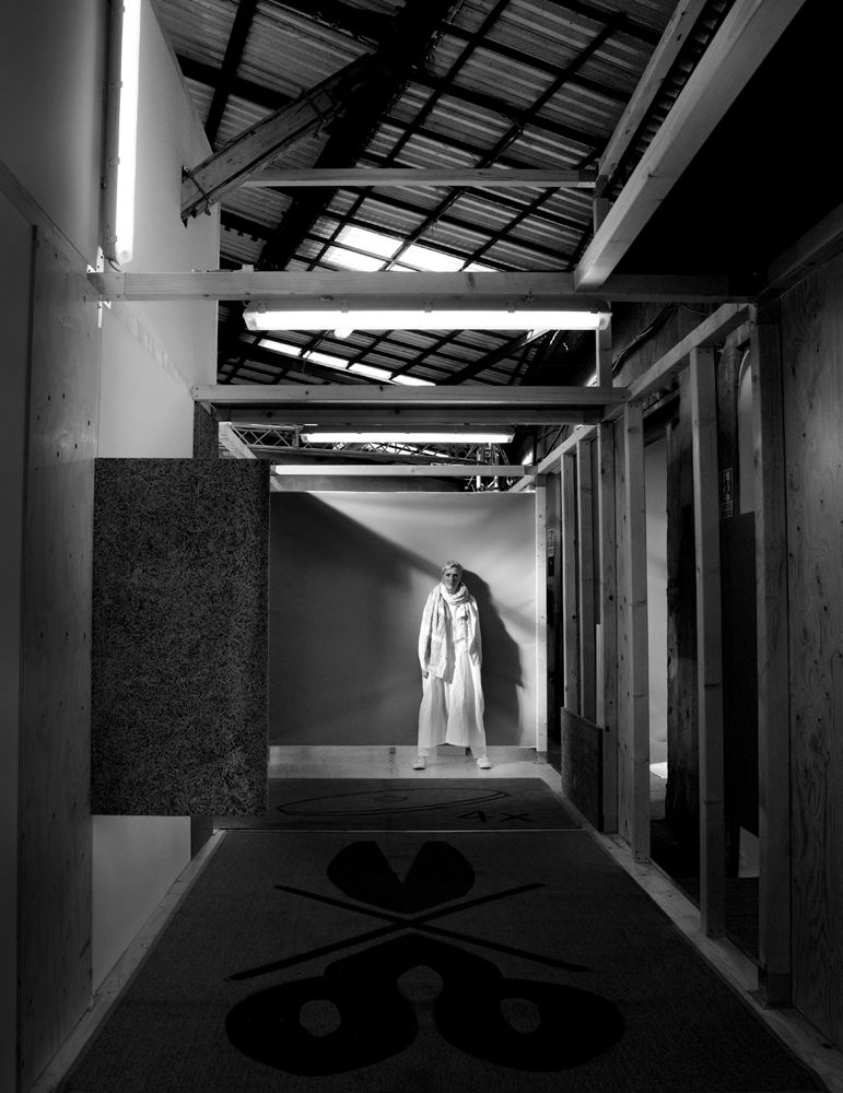 a person standing in a hallway