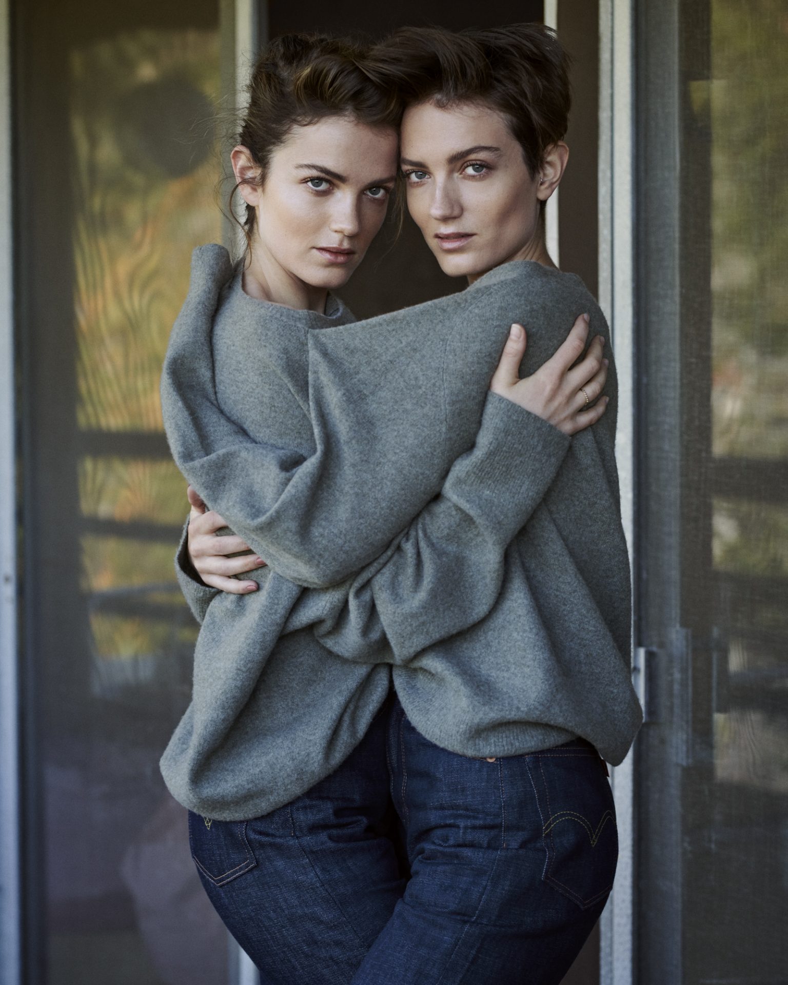 two women hugging each other
