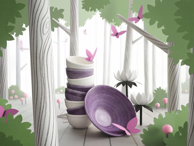 a stack of purple bowls and a purple bowl on a wood deck