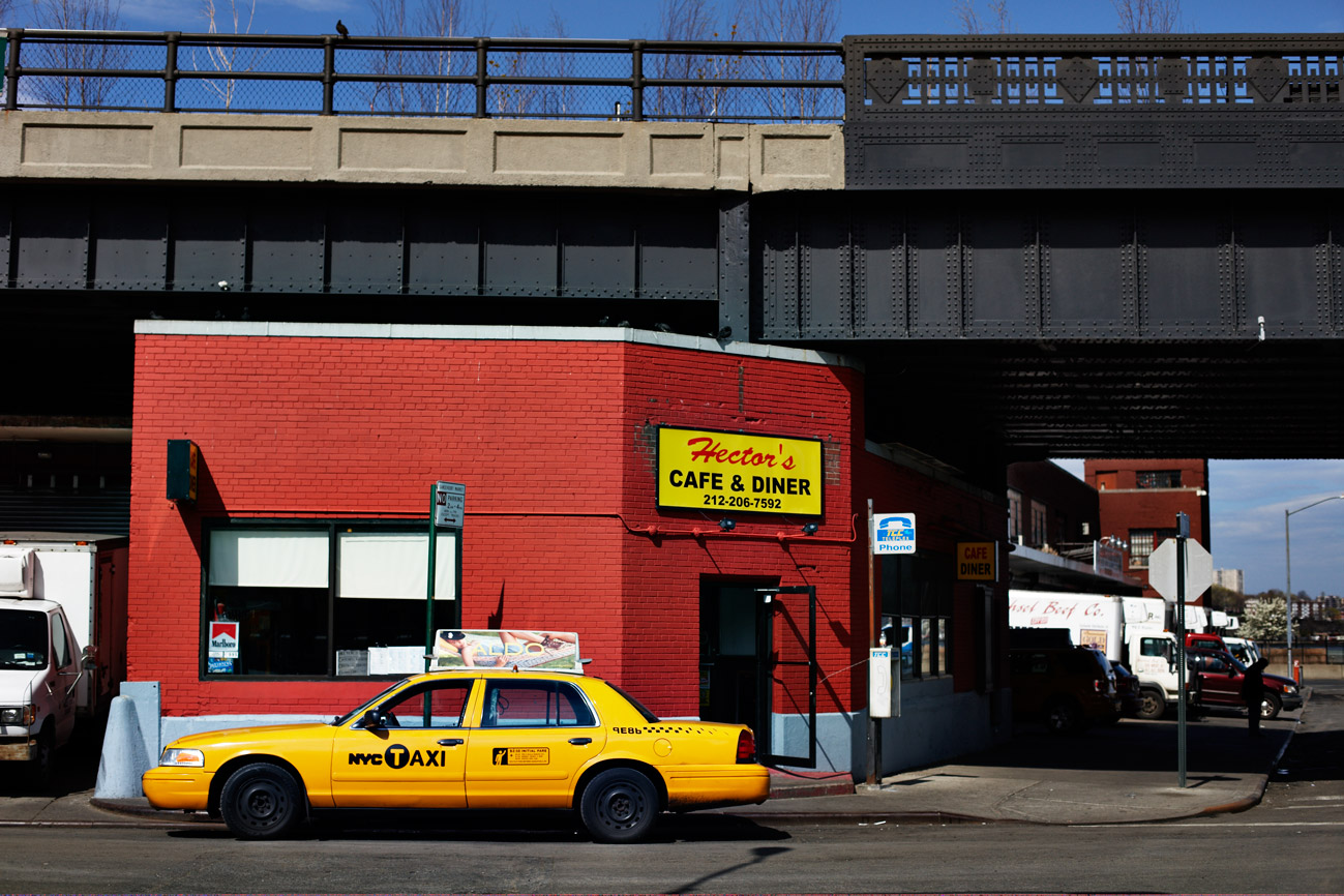 a yellow taxi on the street
