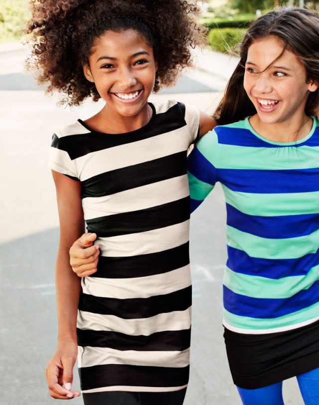 a group of girls smiling