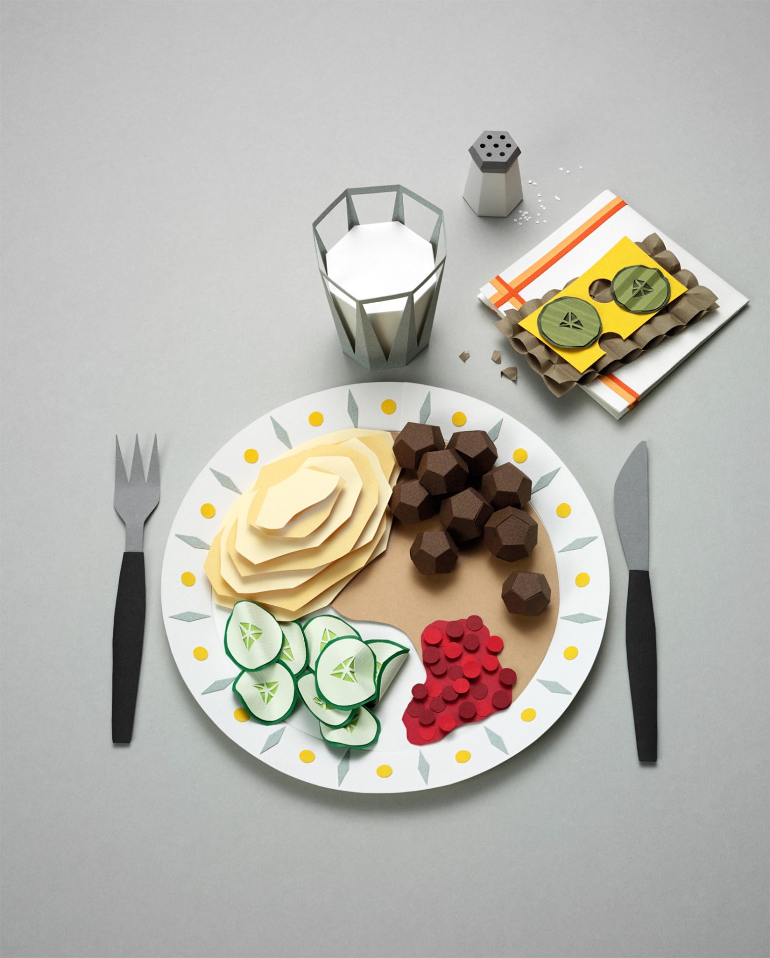 a plate of food and a glass of milk