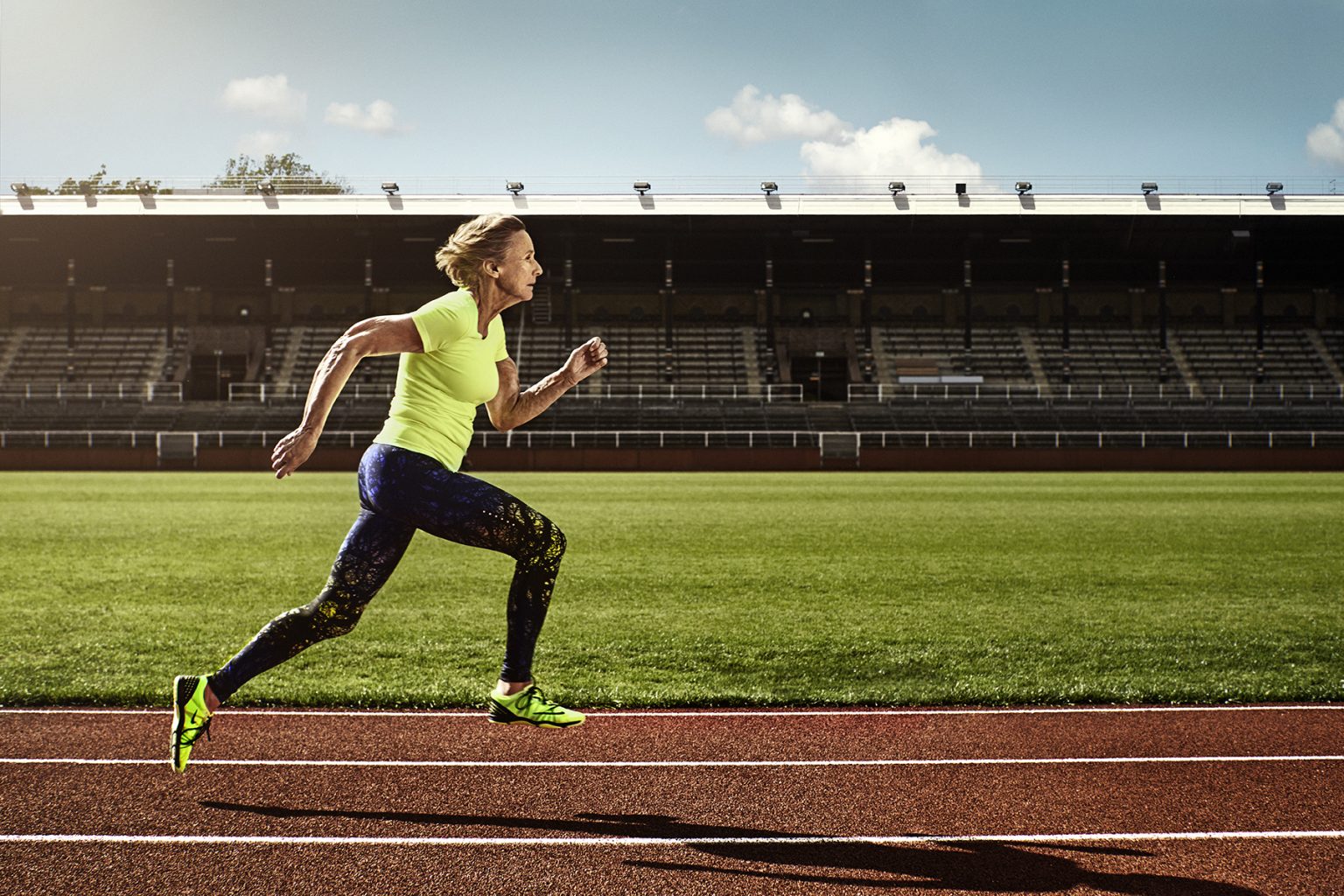 a woman running on a track