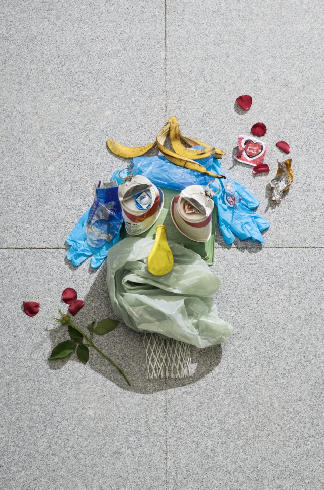 a face made of garbage and trash