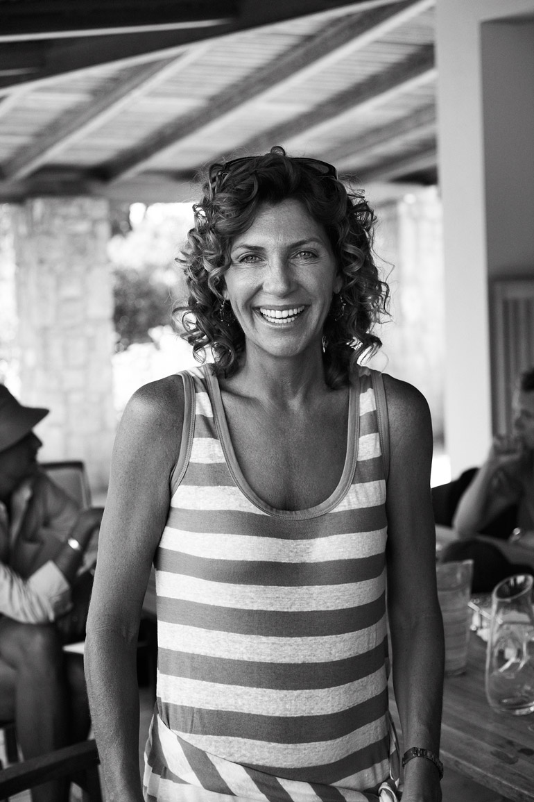 a woman smiling at camera