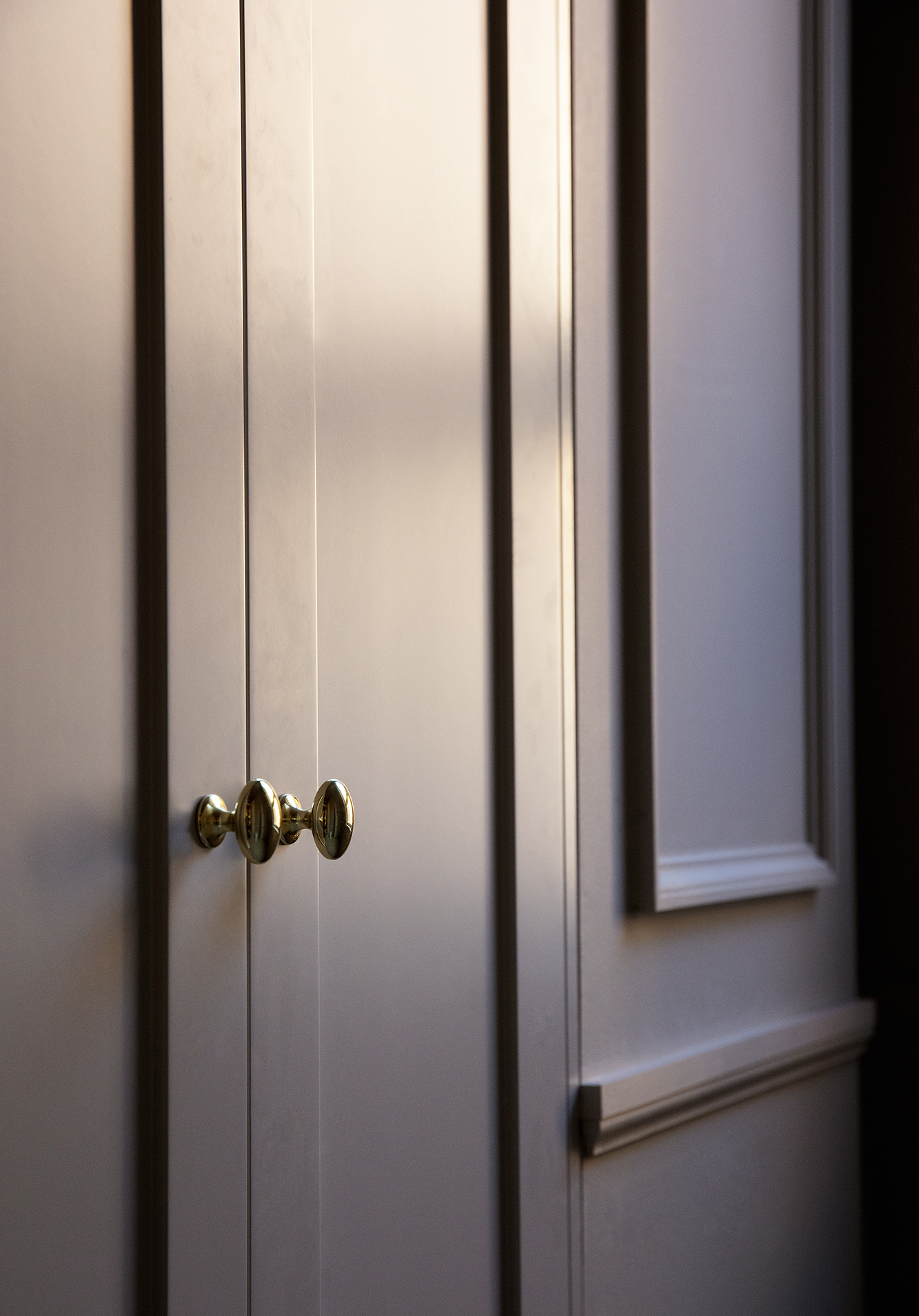 a door with a gold knob