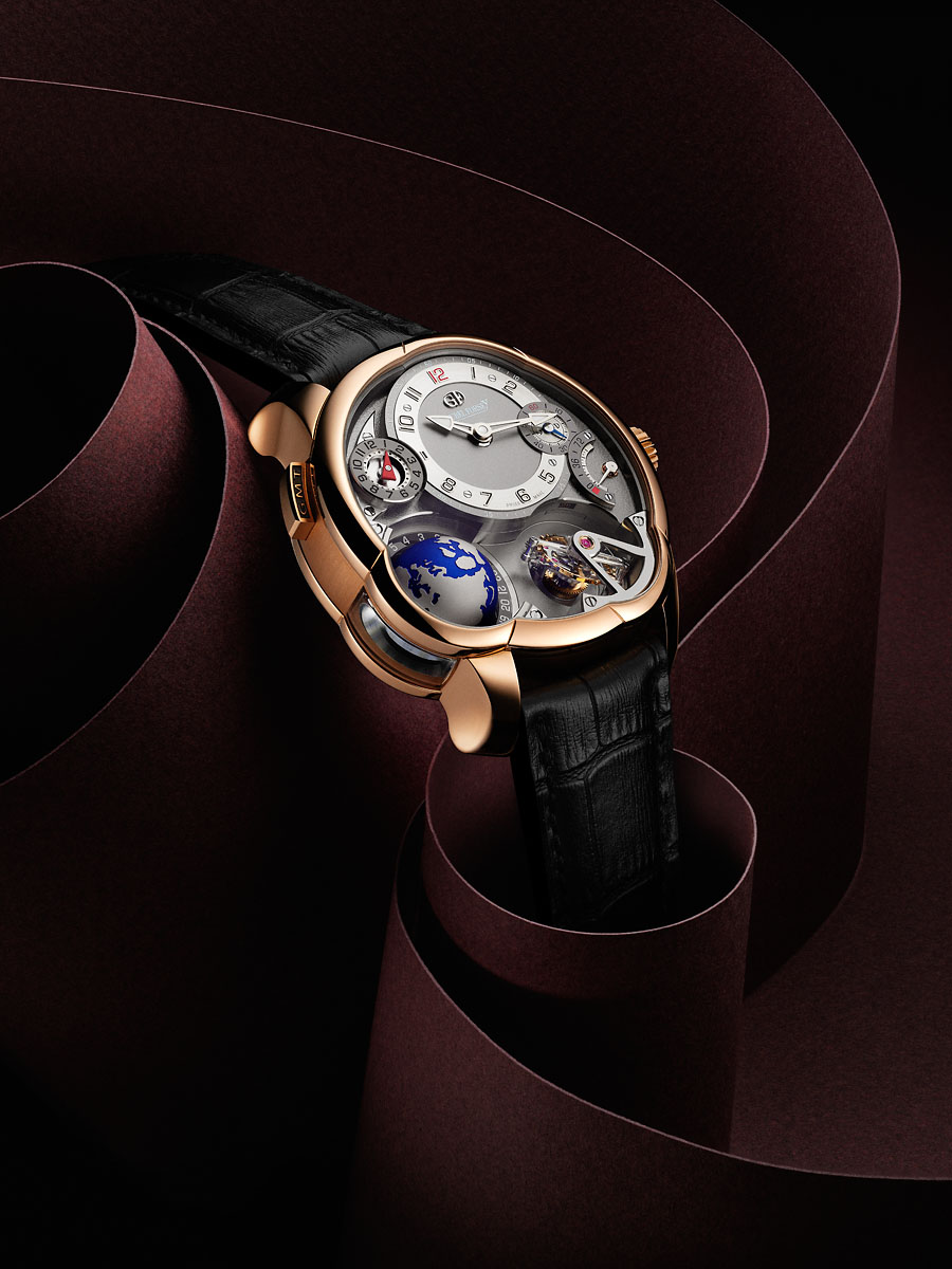 a watch with a black leather strap