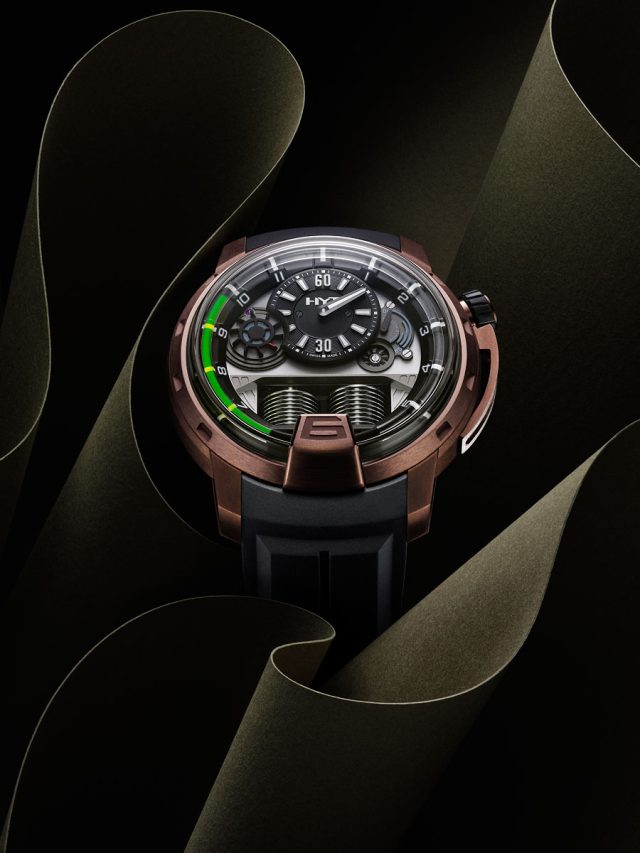 a watch on a black background
