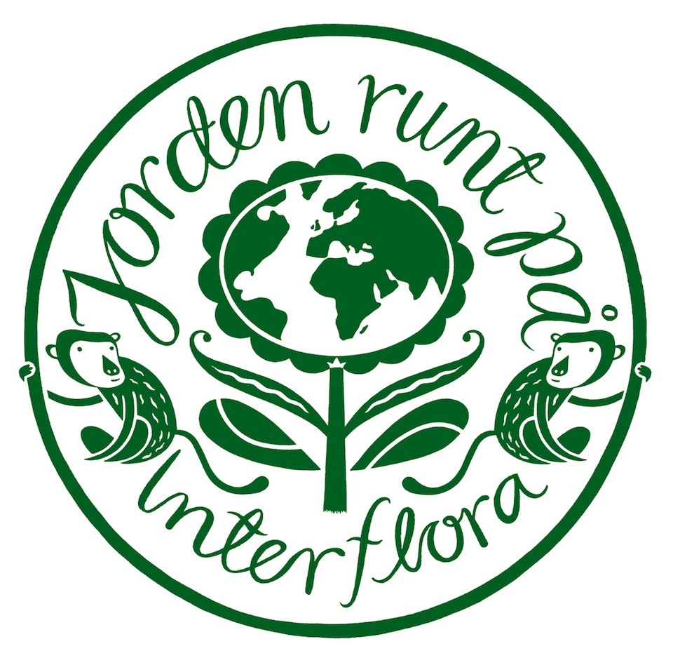 a green circle with a flower and monkeys