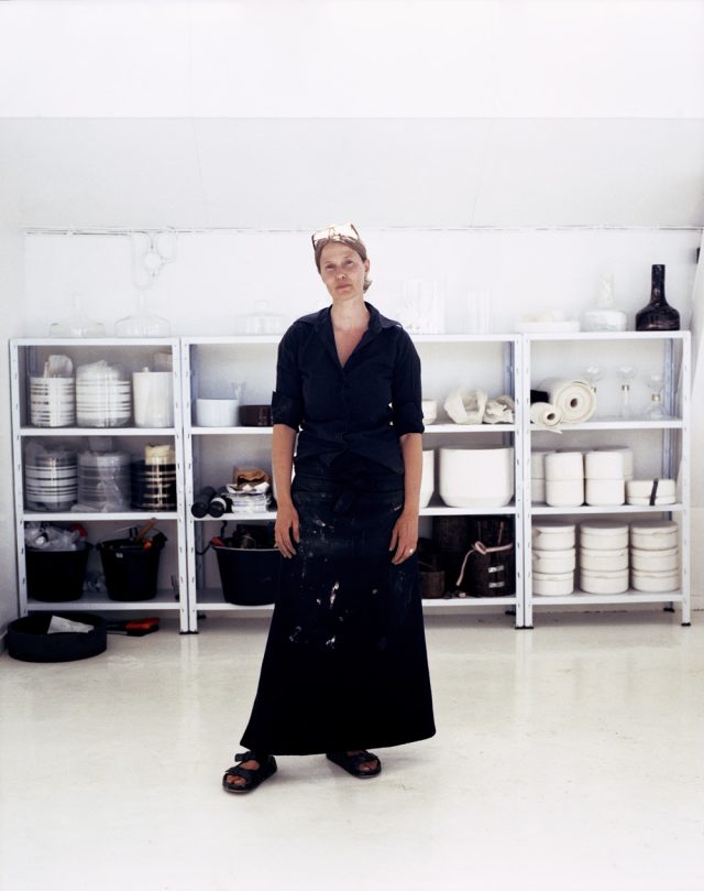 a woman in a black dress