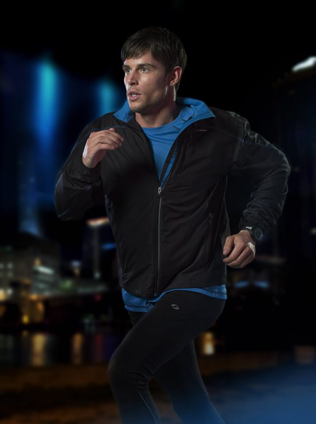 a man running in a blue shirt