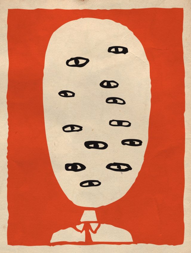 a white balloon with black eyes drawn on it