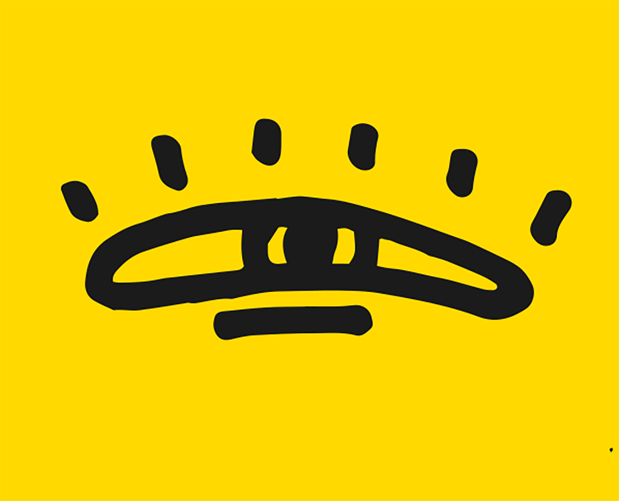 a yellow sign with a black line drawn on it