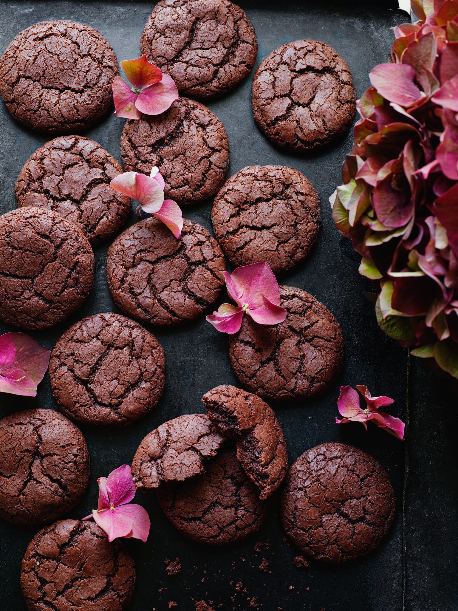 a group of chocolate cookies with flowers