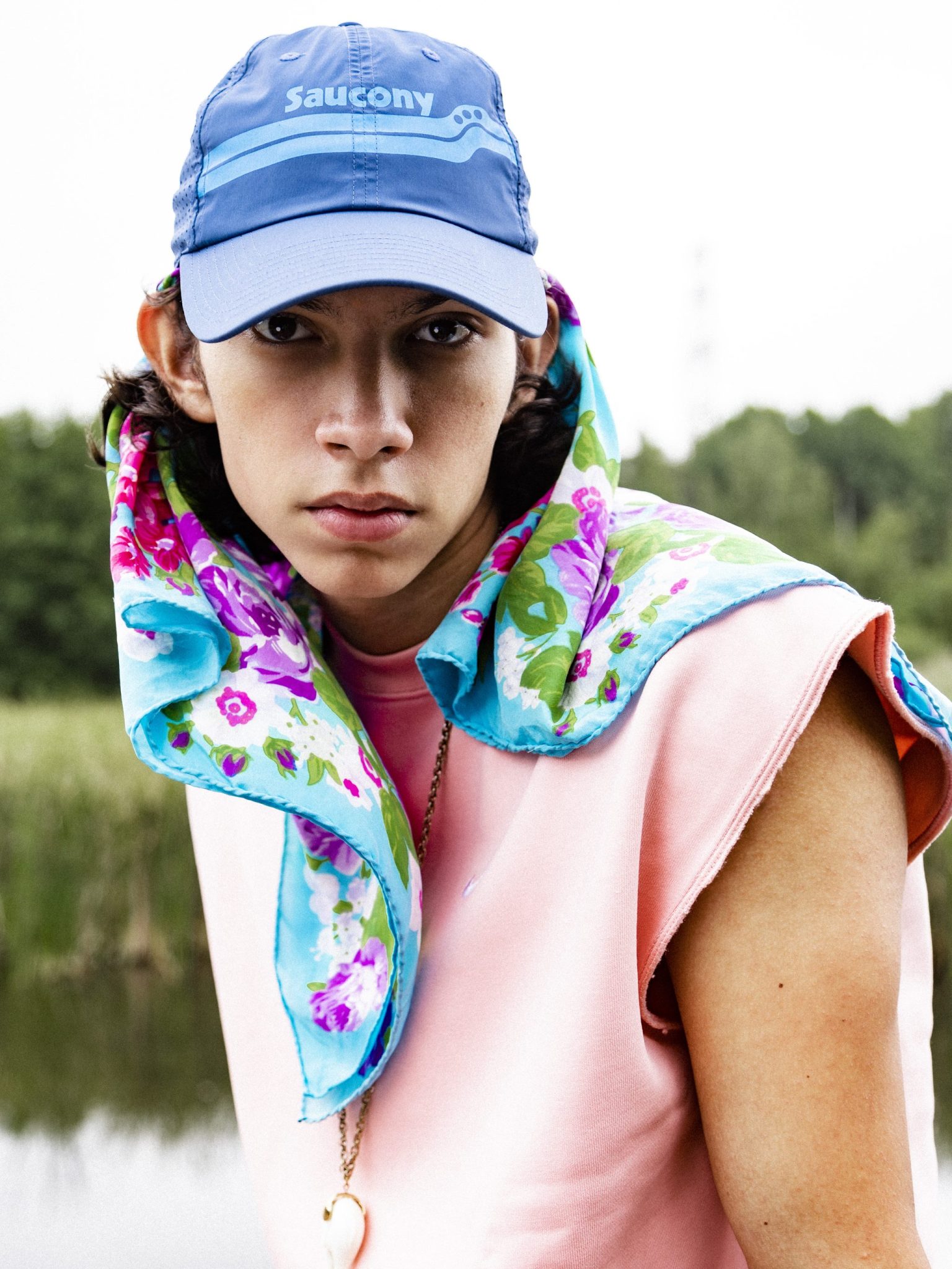 a person wearing a hat and a scarf