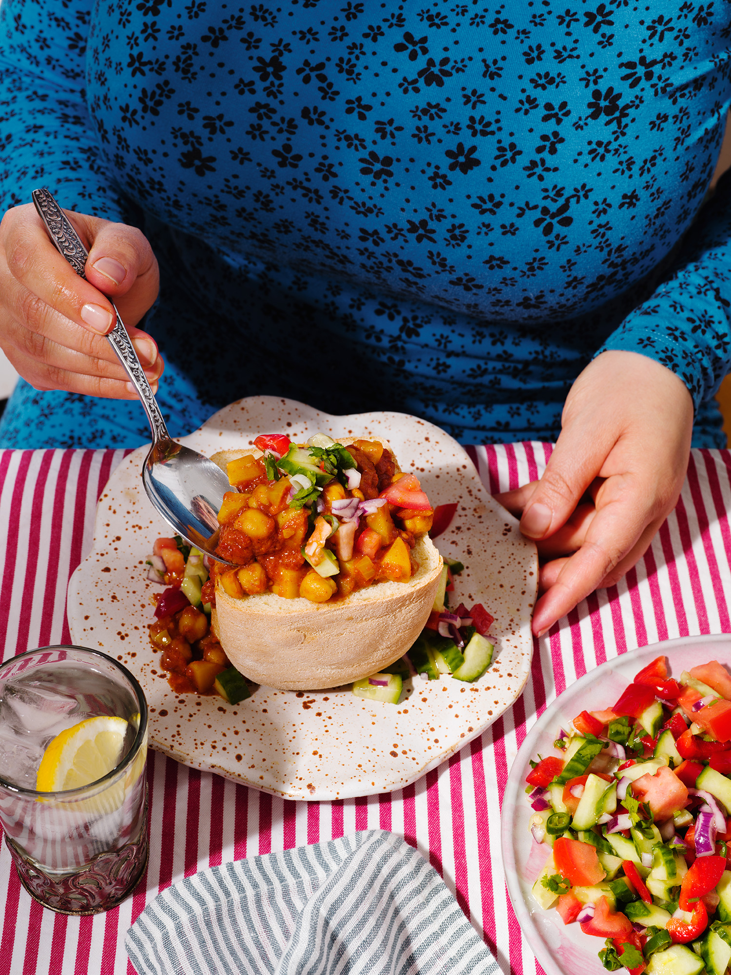 a person eating a bowl of food