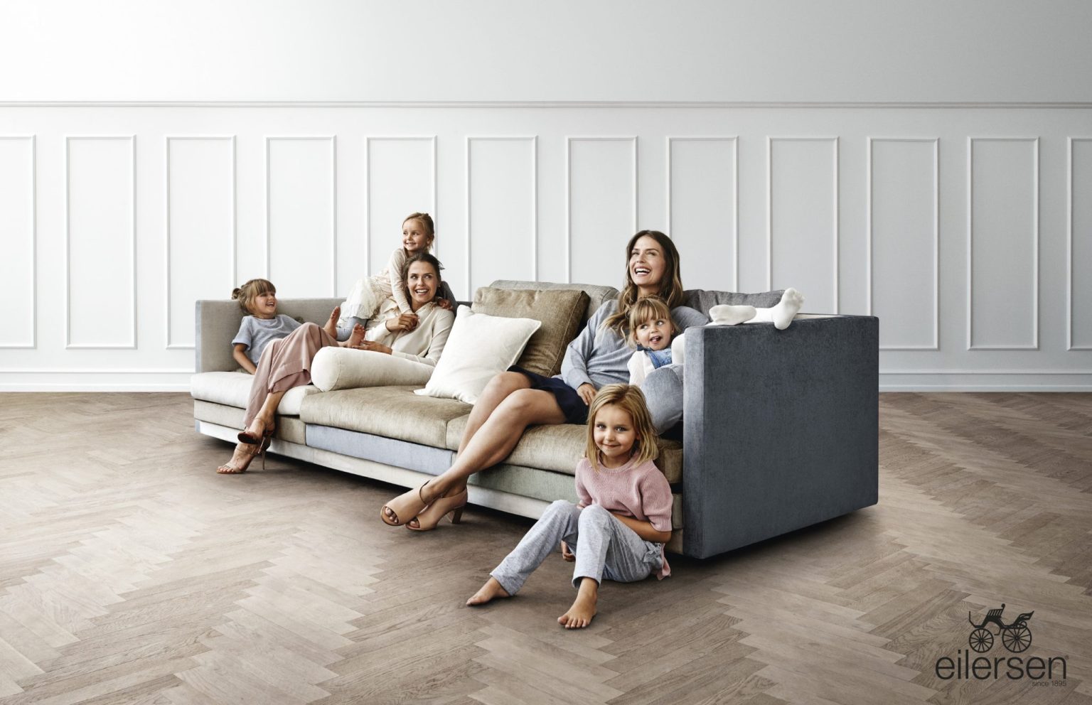 a group of people sitting on a couch