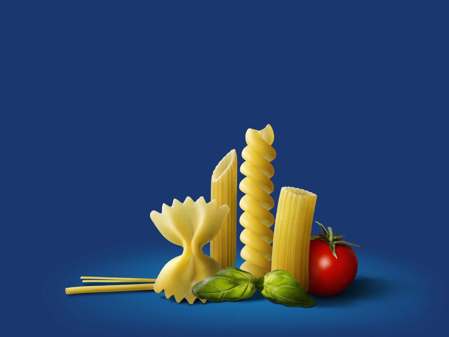 a group of pasta and tomato