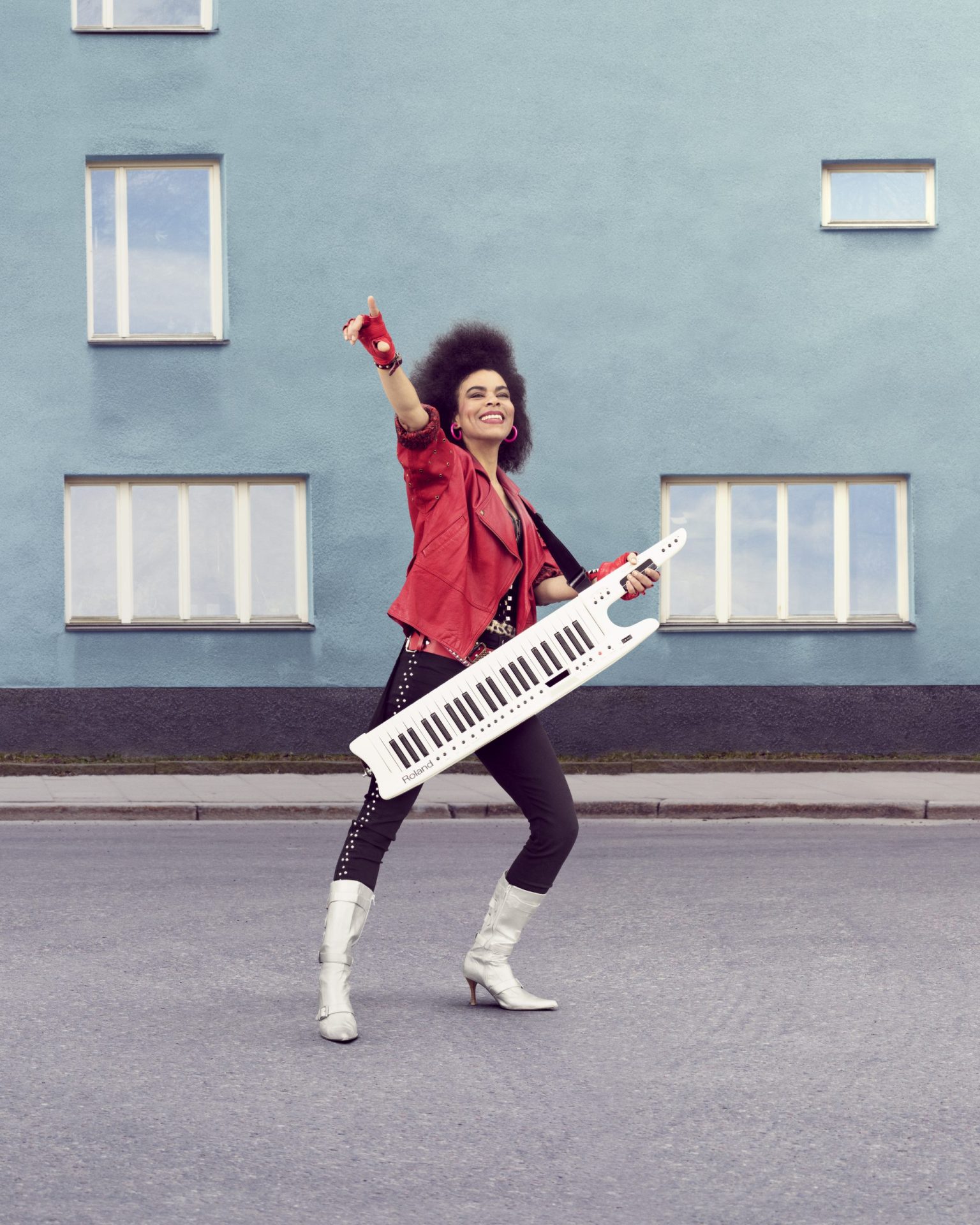 a woman holding a keyboard
