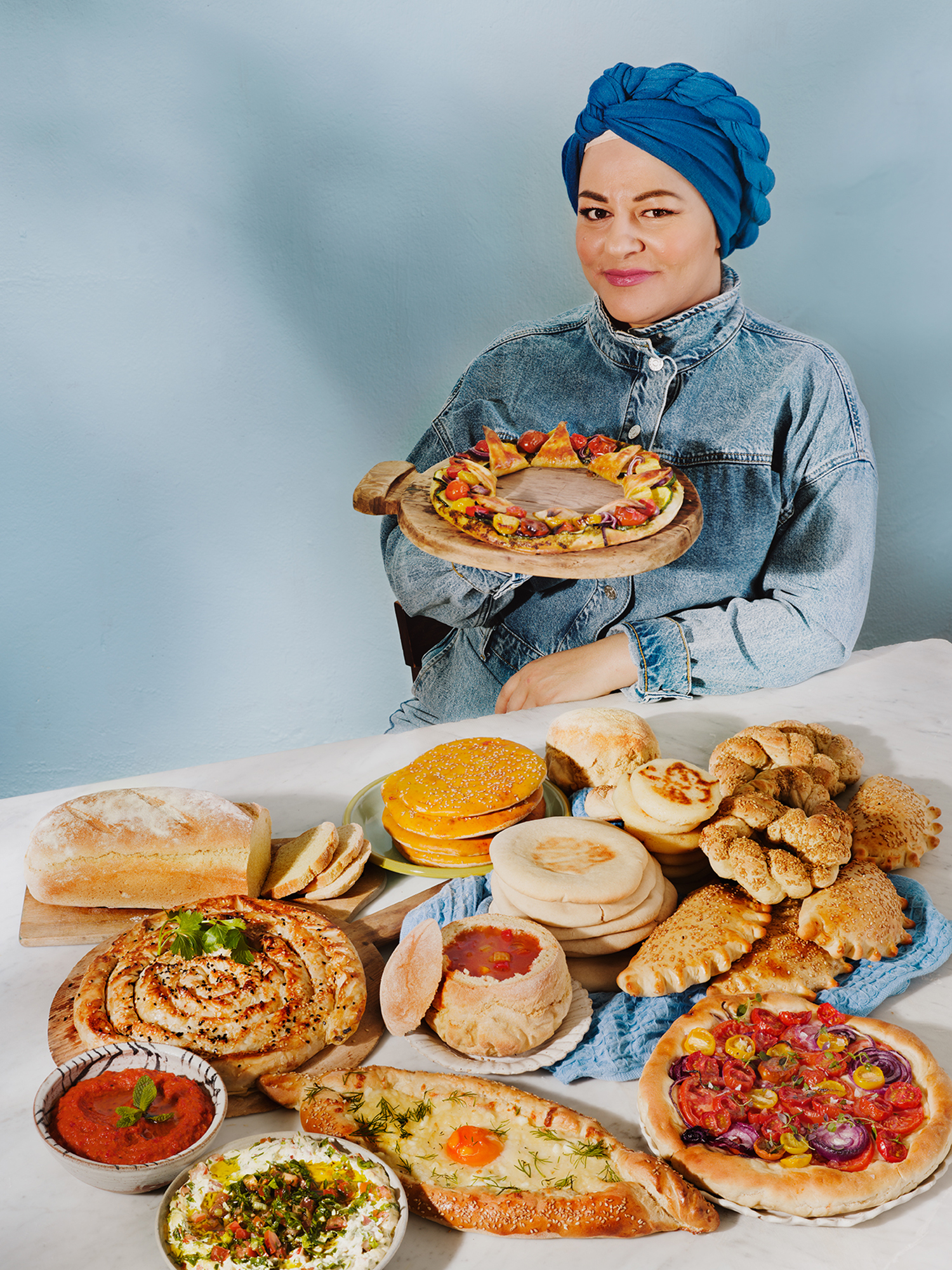 a woman holding a plate of food