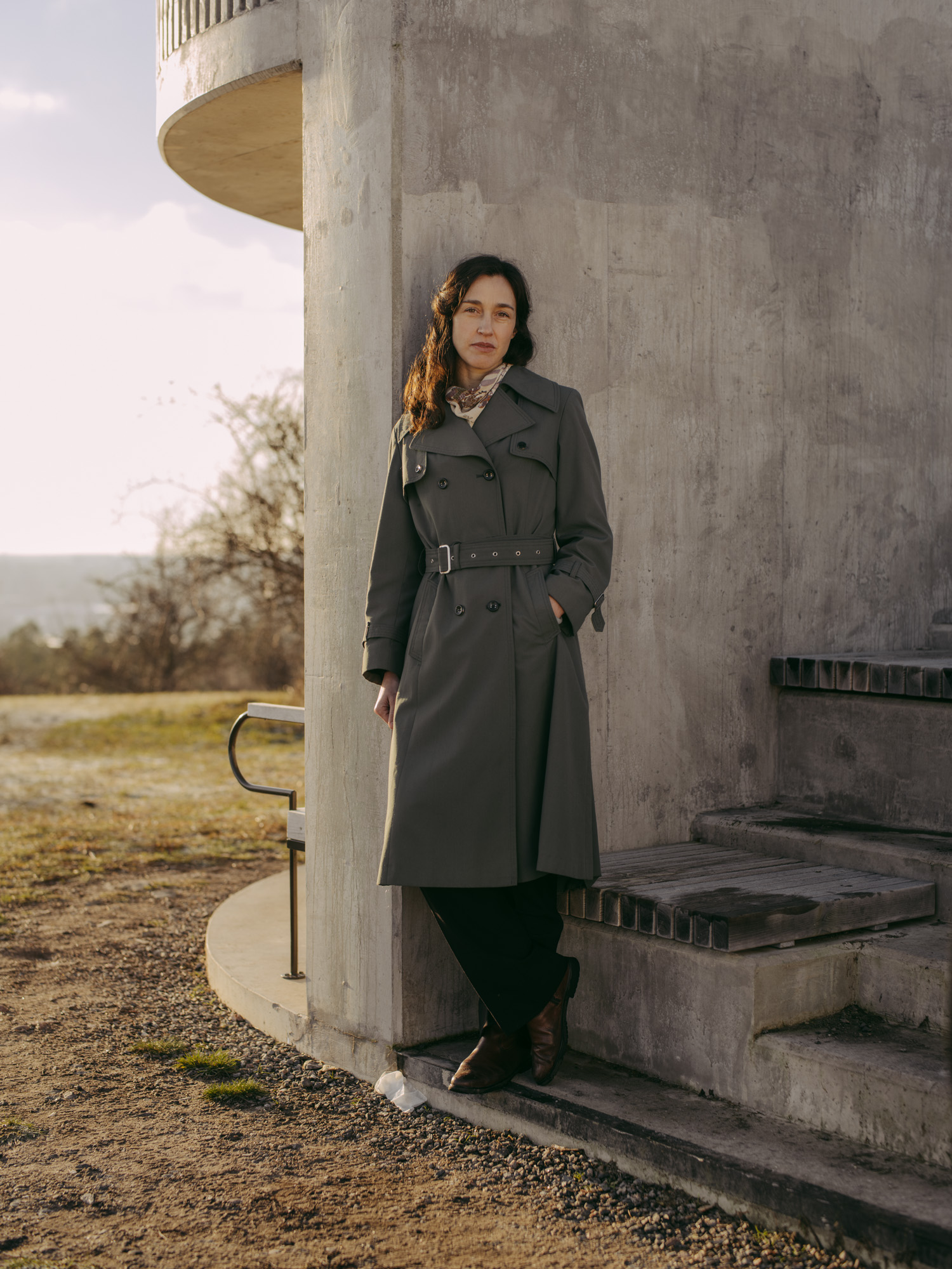a woman standing outside a building
