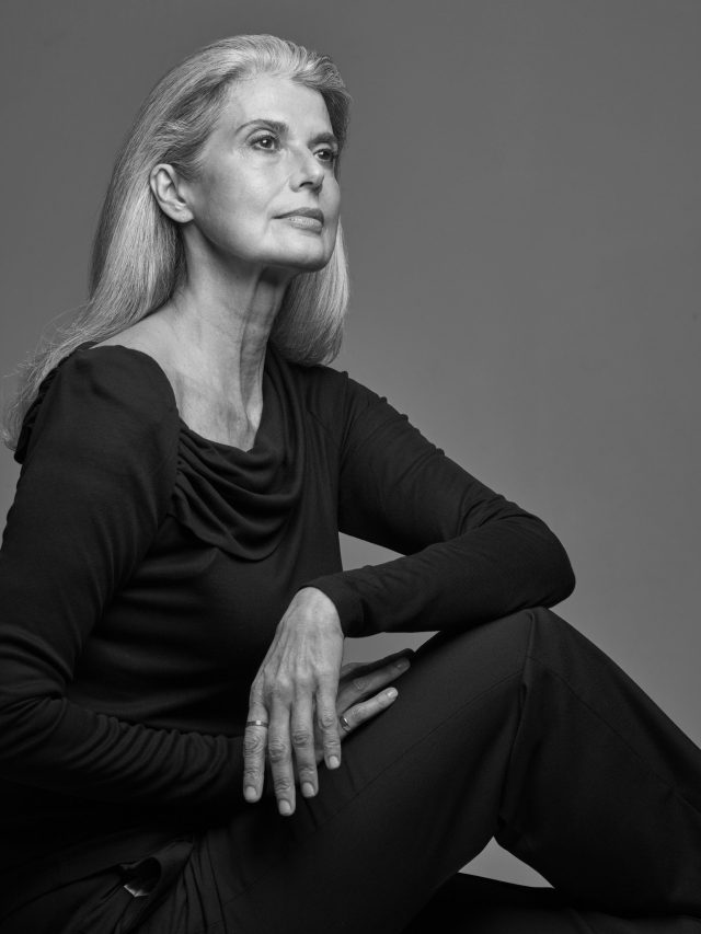 a woman in a black dress