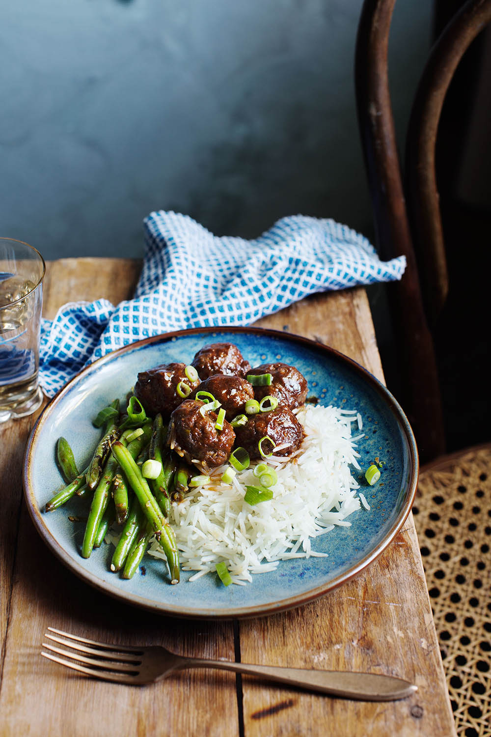 a plate of meatballs and rice