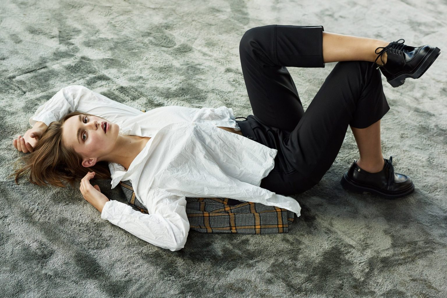 a woman lying on the ground