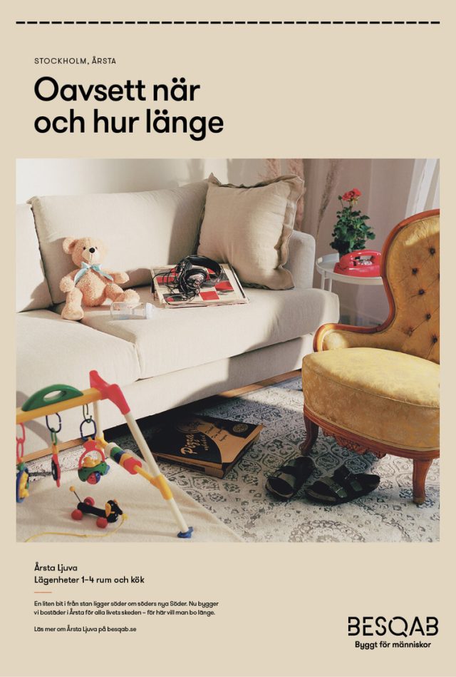 a couch with toys on the floor