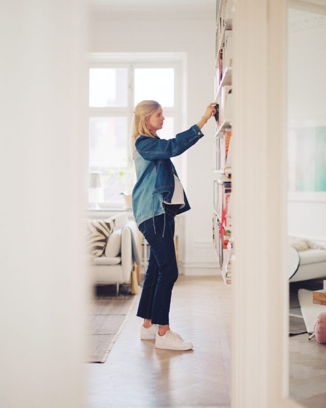 a woman standing in a room