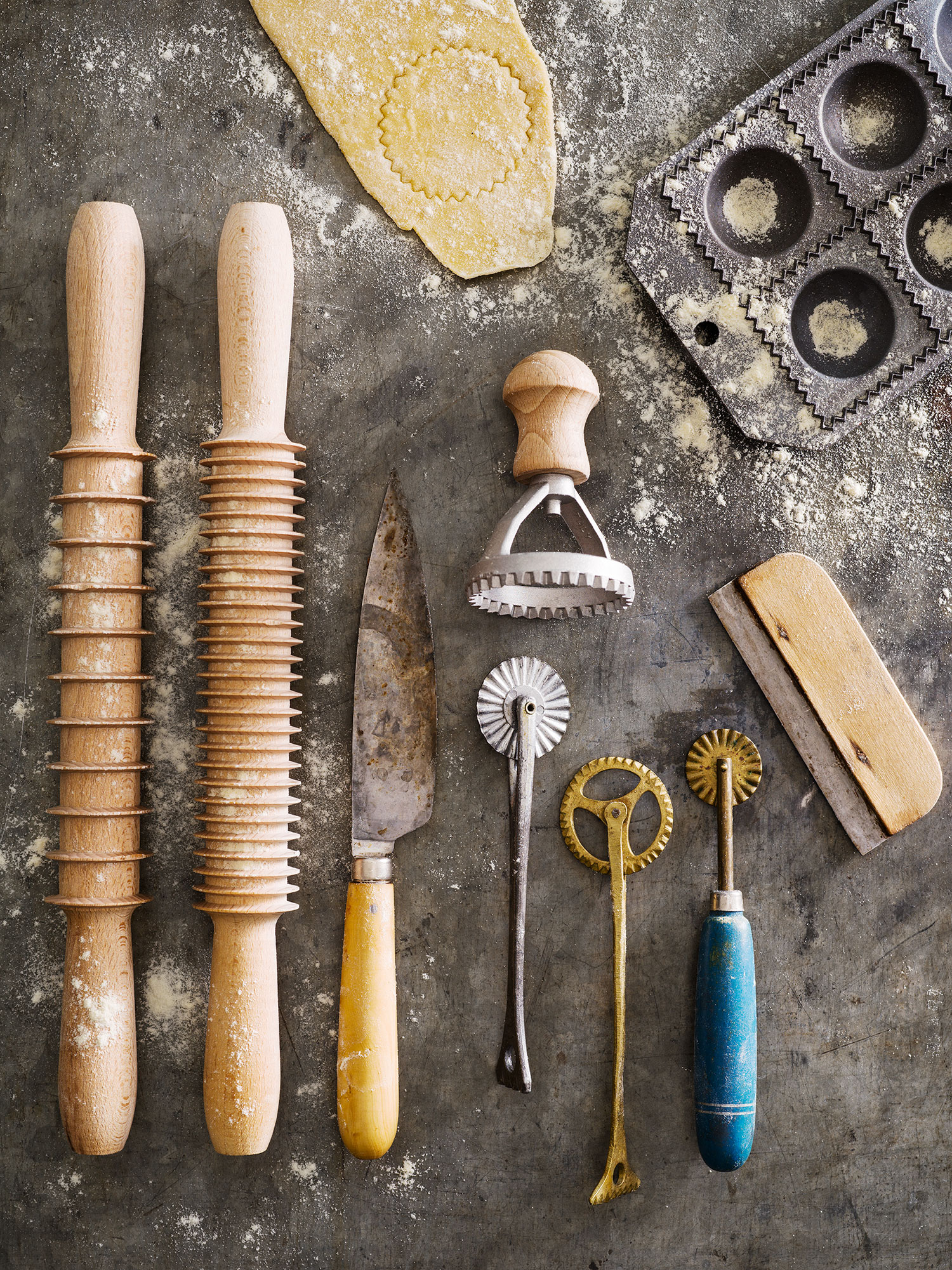 a group of rolling pin and utensils