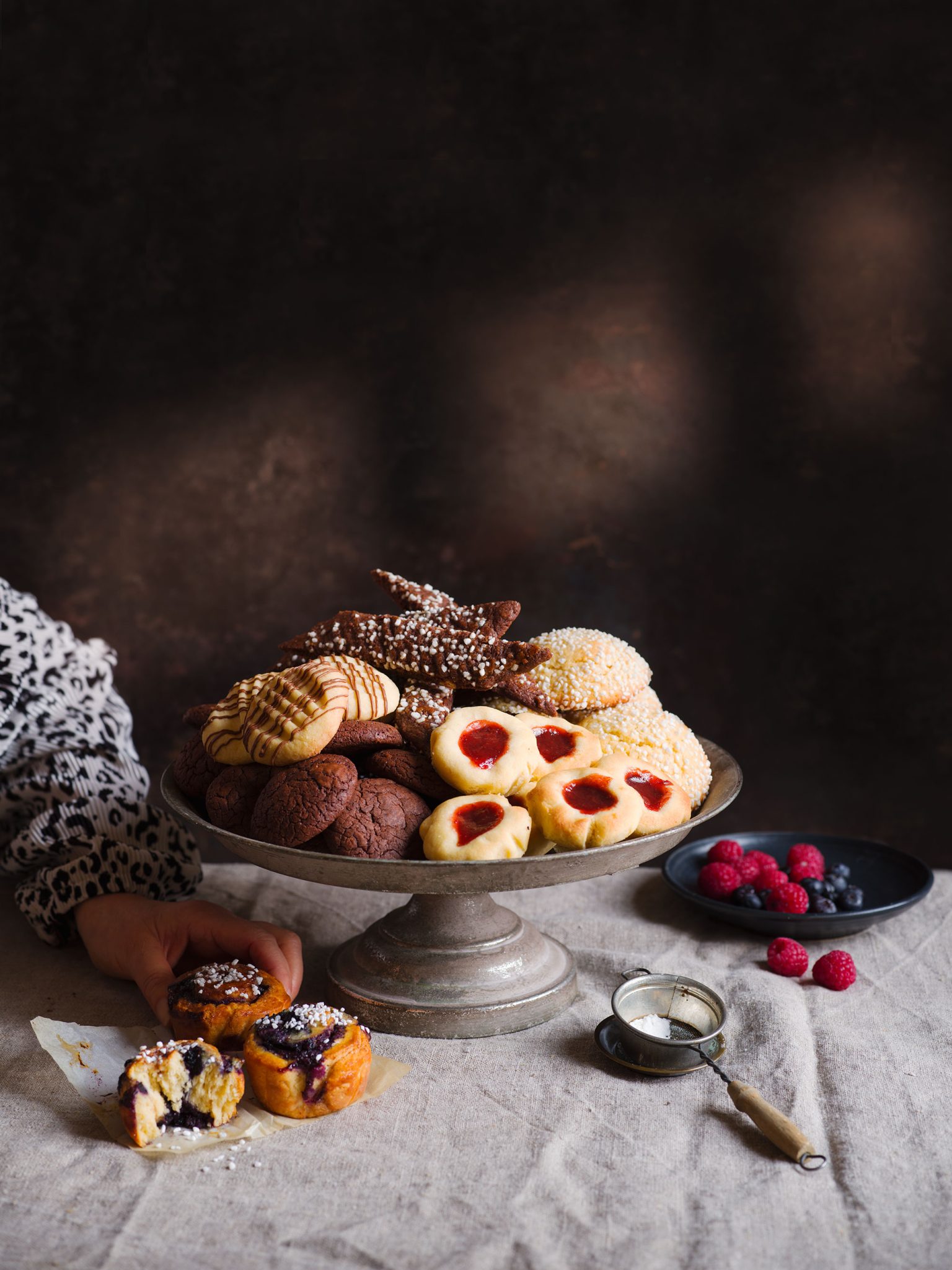 a plate of cookies and pastries