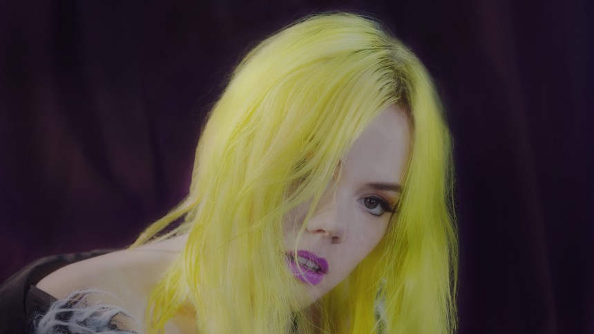 a woman with yellow hair