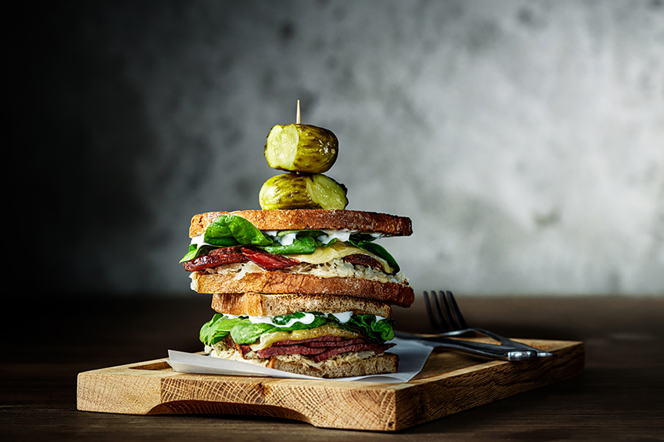 a sandwich on a cutting board