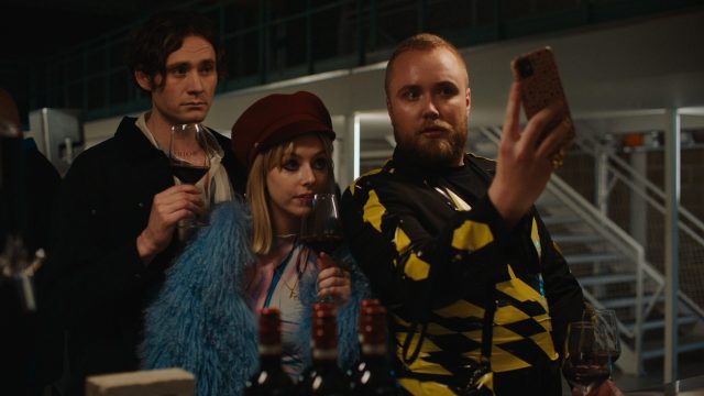 a group of people taking a selfie
