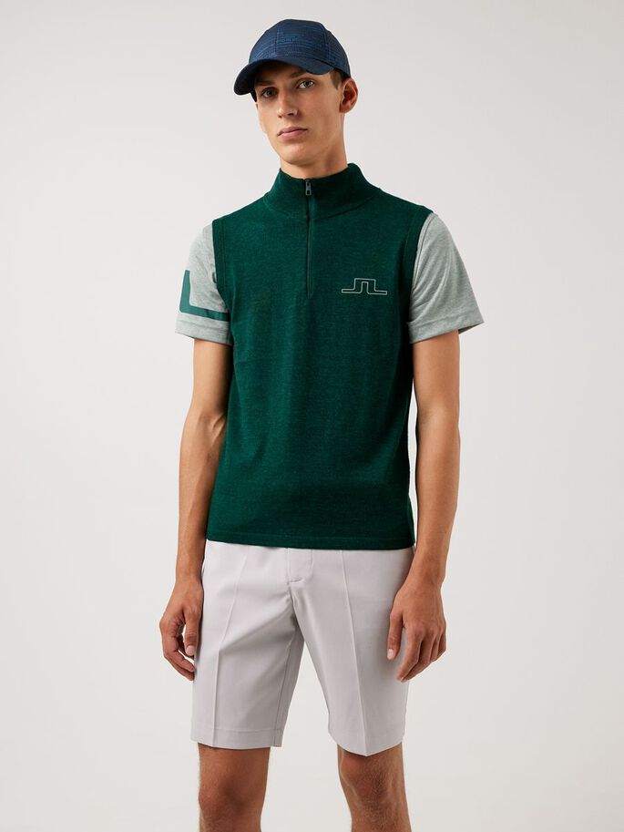 a man in a green shirt